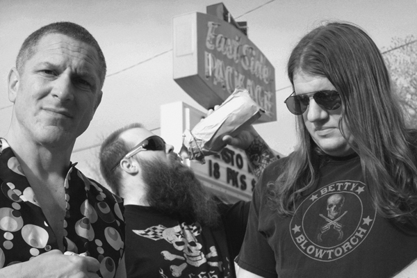 ///  Malt Liquor promotional photo in the parking lot of a liquor store. Miller High Life was in the brown paper bag  ///